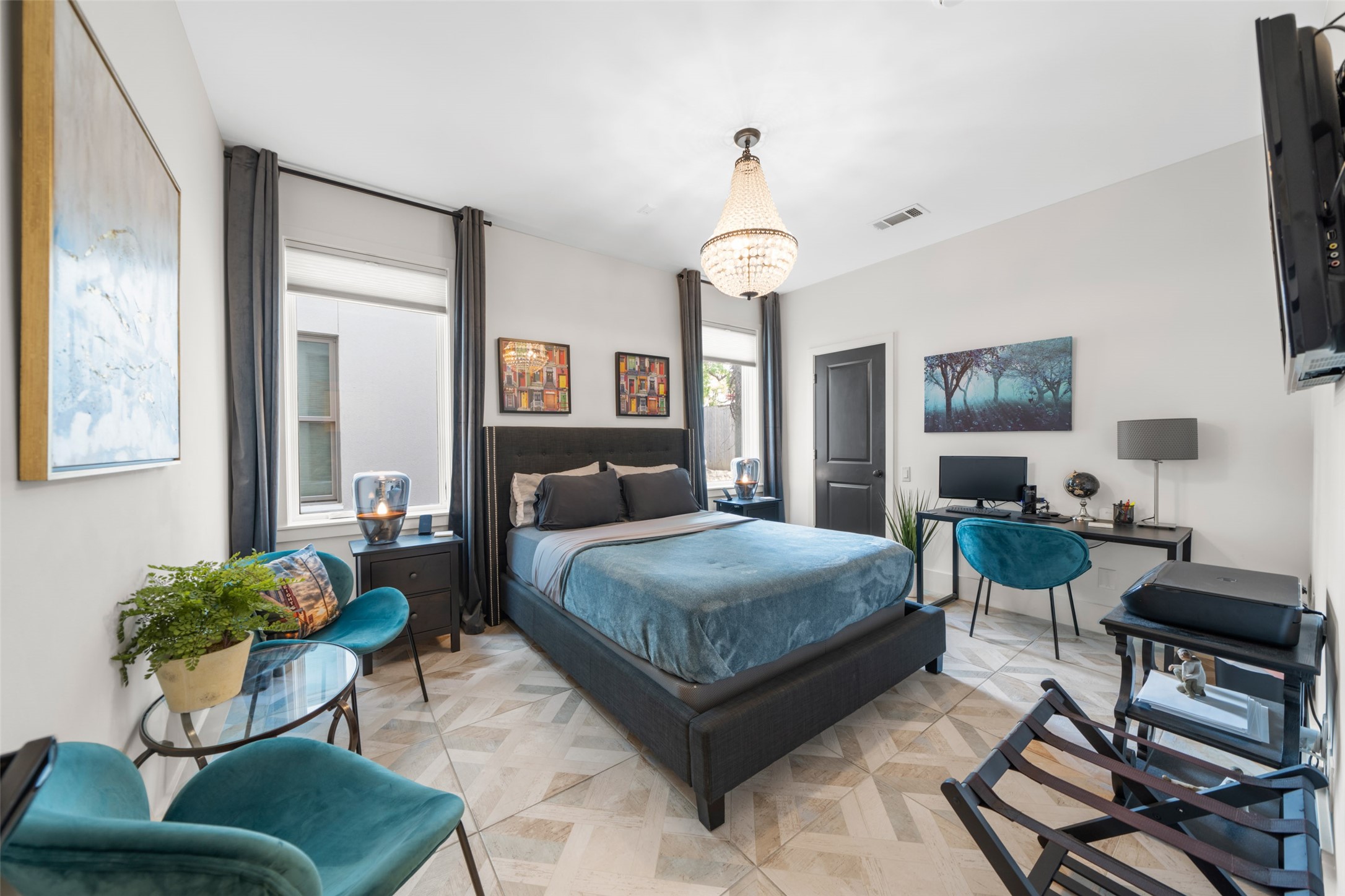 2014 Decatur Street Houston, TX 77007 - Photo 28 of 41 a living room with furniture and a chandelier