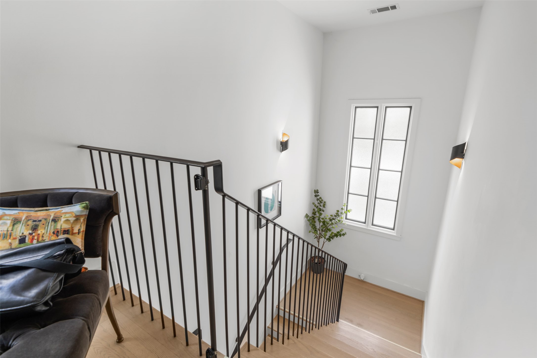 2014 Decatur Street Houston, TX 77007 - Photo 4 of 41 a view of a hallway with windows and stairs