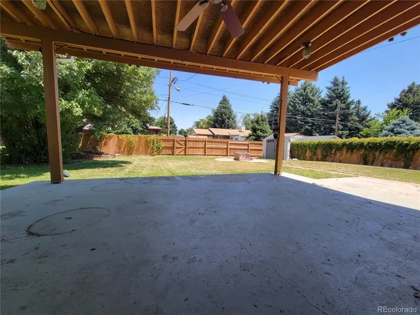 a view of swimming pool with a patio