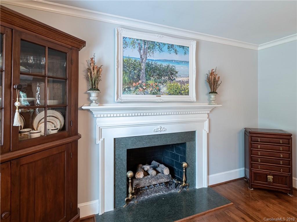 3200 Wickersham Road Charlotte, NC 28211 - Photo 11 of 40 a living room with furniture and a fireplace