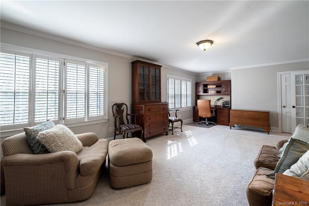 3200 Wickersham Road Charlotte, NC 28211 - Photo 19 of 40 a living room with furniture and a window