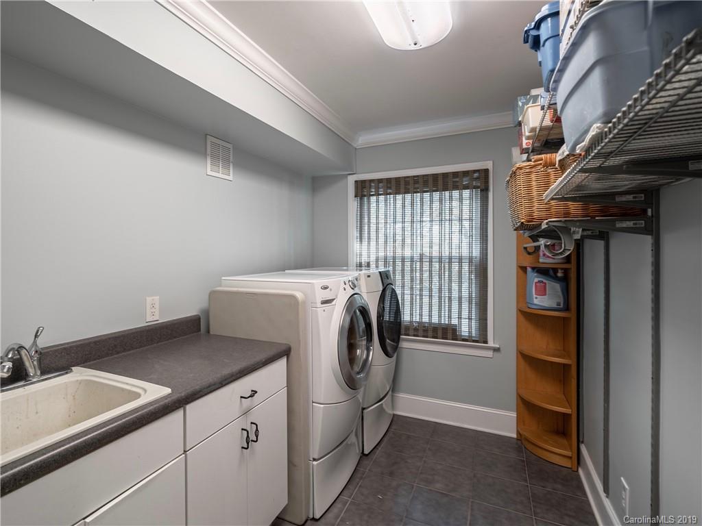 3200 Wickersham Road Charlotte, NC 28211 - Photo 20 of 40 a utility room with dryer and washer