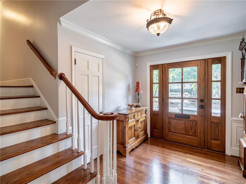 3200 Wickersham Road Charlotte, NC 28211 - Photo 21 of 40 a view of an entryway with wooden floor and windows