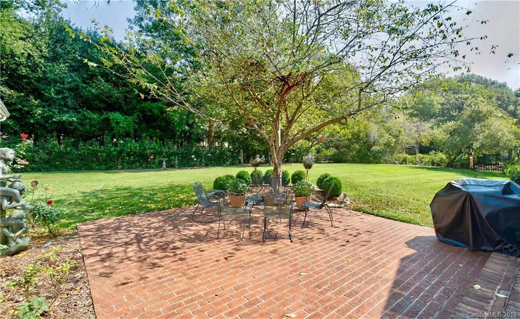 3200 Wickersham Road Charlotte, NC 28211 - Photo 28 of 40 a view of a chair and table on the wooden floor
