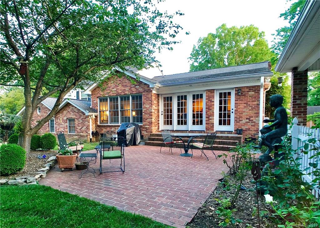 3200 Wickersham Road Charlotte, NC 28211 - Photo 29 of 40 a view of a house with backyard sitting area and garden