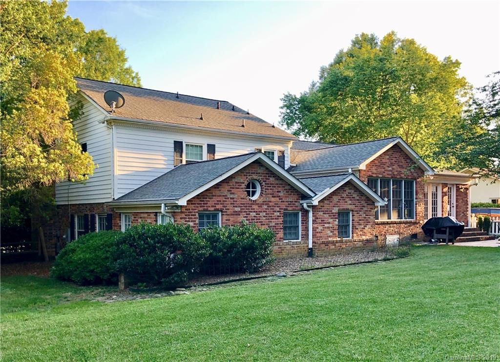 3200 Wickersham Road Charlotte, NC 28211 - Photo 32 of 40 a front view of a house with a garden