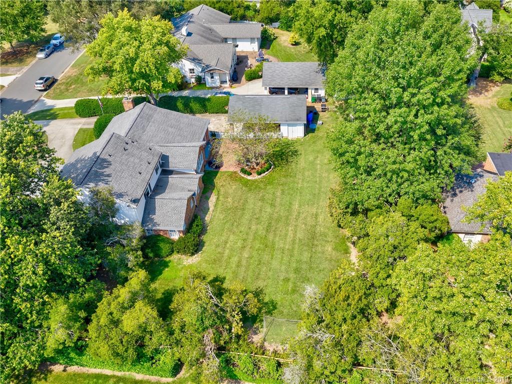 3200 Wickersham Road Charlotte, NC 28211 - Photo 37 of 40 an aerial view of residential houses with outdoor space and trees all around