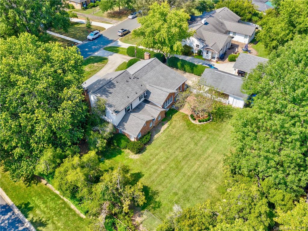 3200 Wickersham Road Charlotte, NC 28211 - Photo 38 of 40 an aerial view of a house with a garden and swimming pool
