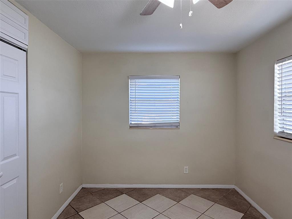 3704 36th Street West Bradenton, FL 34205 - Photo 19 of 34 wooden floor in an empty room with a window