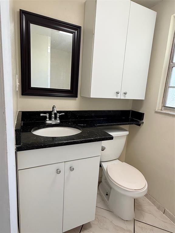 3704 36th Street West Bradenton, FL 34205 - Photo 23 of 34 a bathroom with a sink and a toilet
