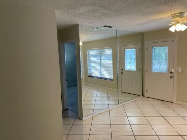 wooden floor with a bathroom