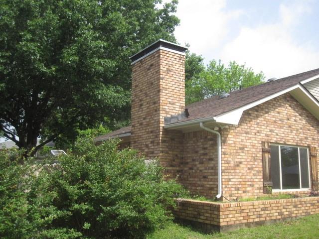 2801 Pyramid Circle Denison, TX 75020 - Photo 2 of 18 a backyard of a house with lots of green space