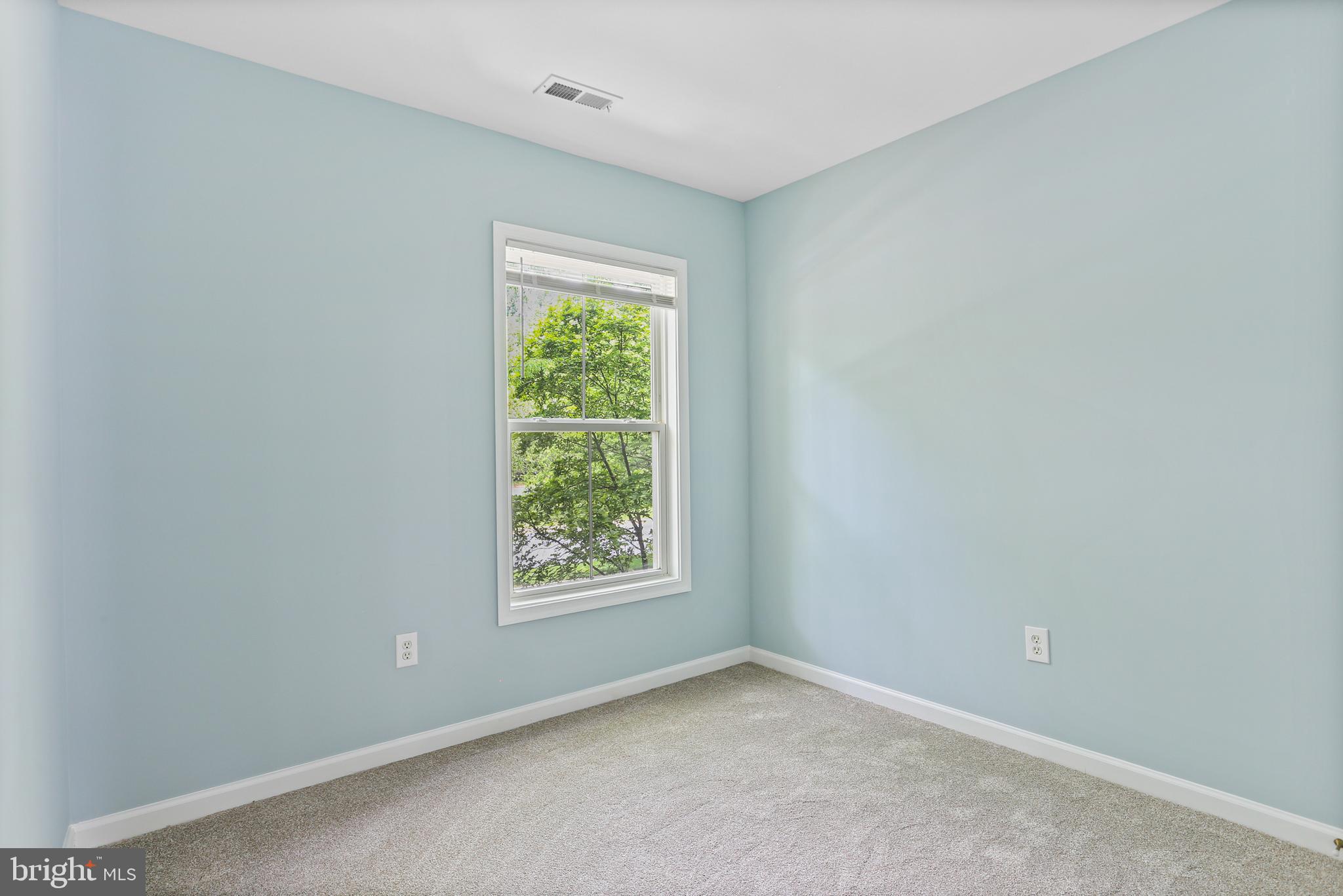 10232 Rutland Round Road, Unit 24 Columbia, MD 21044 - Photo 19 of 31 an empty room with a window
