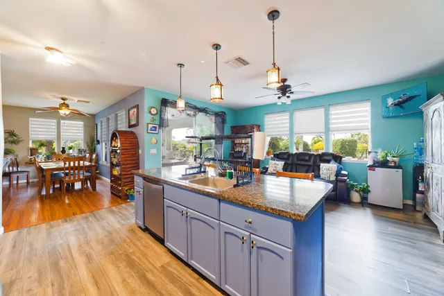 a view of a kitchen and dining room