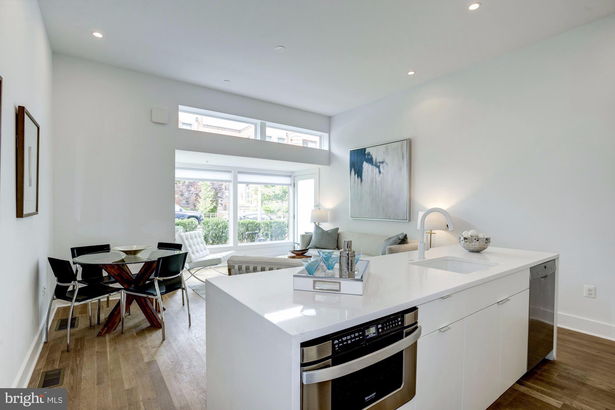 1106 T Street Northwest Washington, DC 20009 - Photo 8 of 29 Gormet kitchen opens to living area