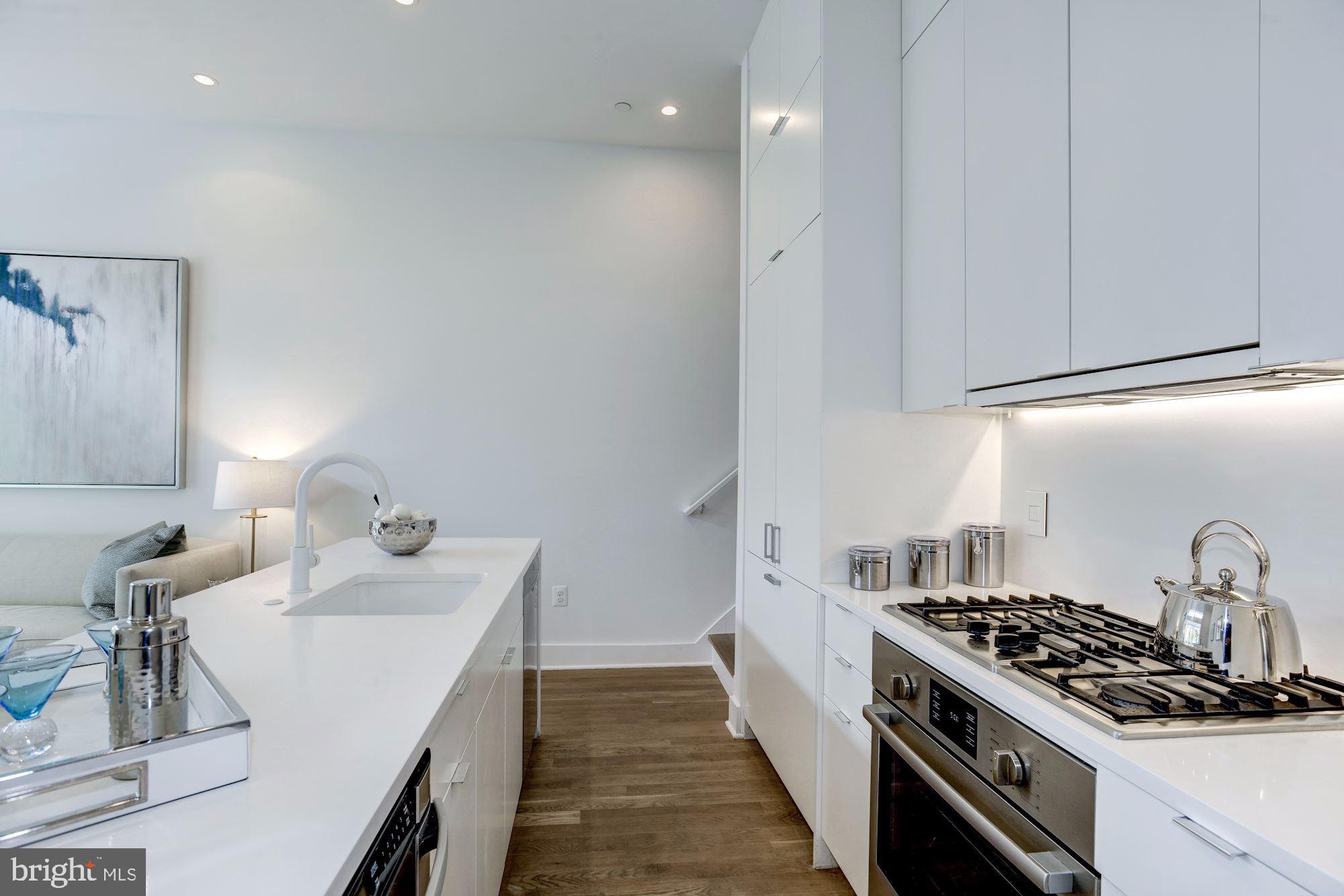 1106 T Street Northwest Washington, DC 20009 - Photo 10 of 29 Gourmet kitchen with top of the line appliances