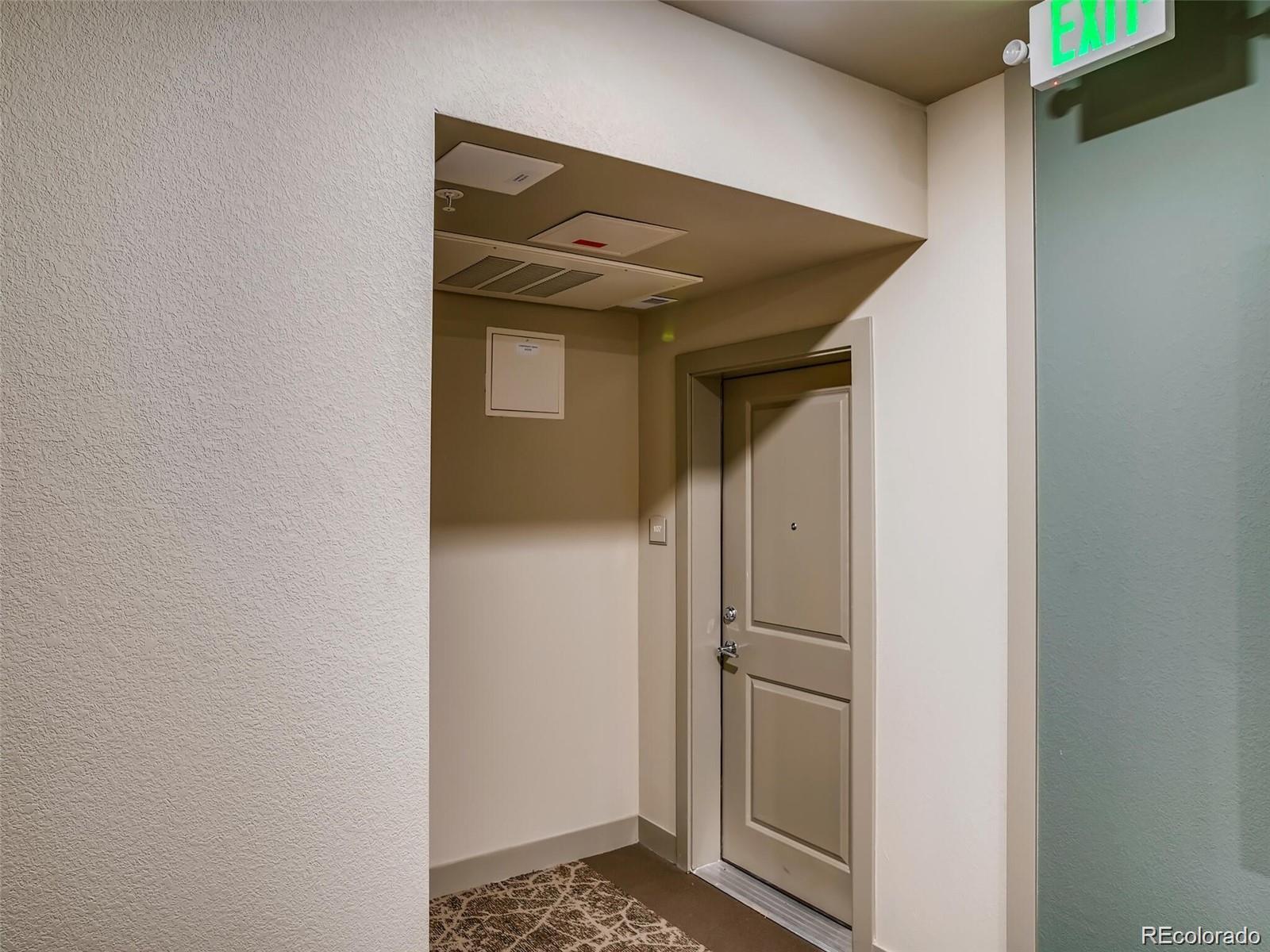 15274 West 64th Lane, Unit 107 Arvada, CO 80007 - Photo 21 of 24 a view of front door
