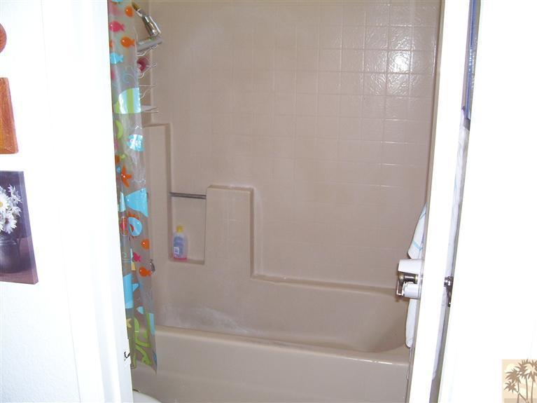 68325 Encinitas Road Cathedral City, CA 92234 - Photo 11 of 20 a bathroom with a bathtub