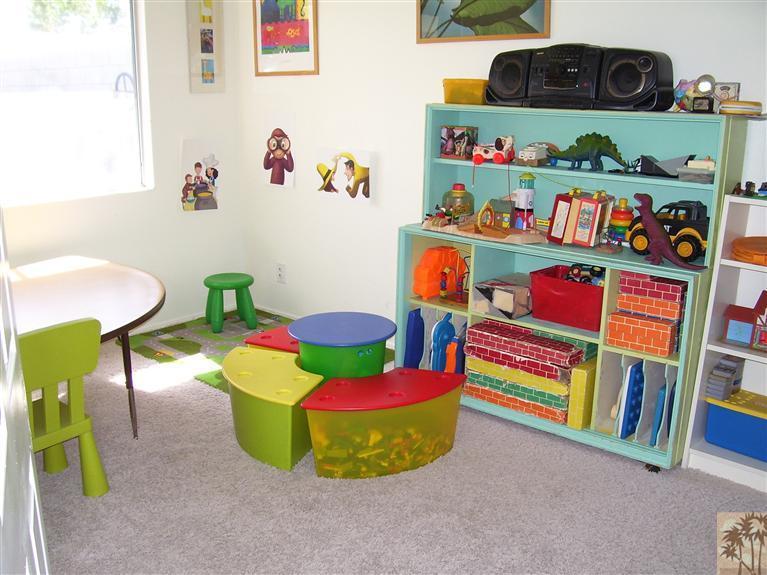 68325 Encinitas Road Cathedral City, CA 92234 - Photo 15 of 20 a room with toys and a book shelf