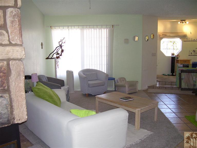 68325 Encinitas Road Cathedral City, CA 92234 - Photo 6 of 20 a living room with furniture and a wooden floor