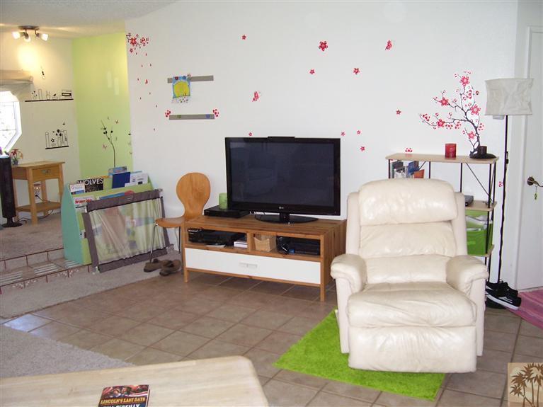 68325 Encinitas Road Cathedral City, CA 92234 - Photo 7 of 20 a living room with furniture and a flat screen tv
