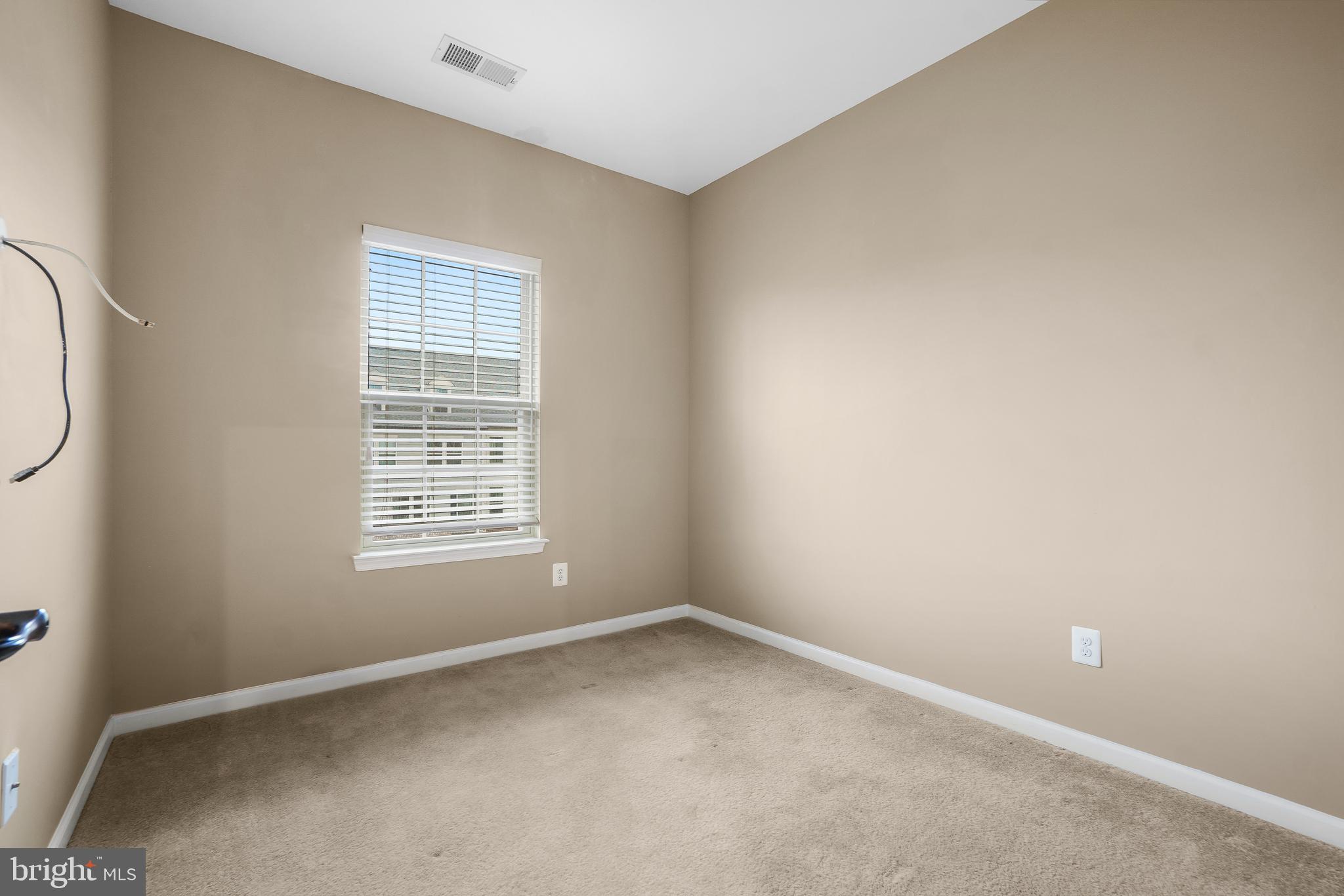 2011 Serviceberry Road Dumfries, VA 22026 - Photo 13 of 25 an empty room with a window