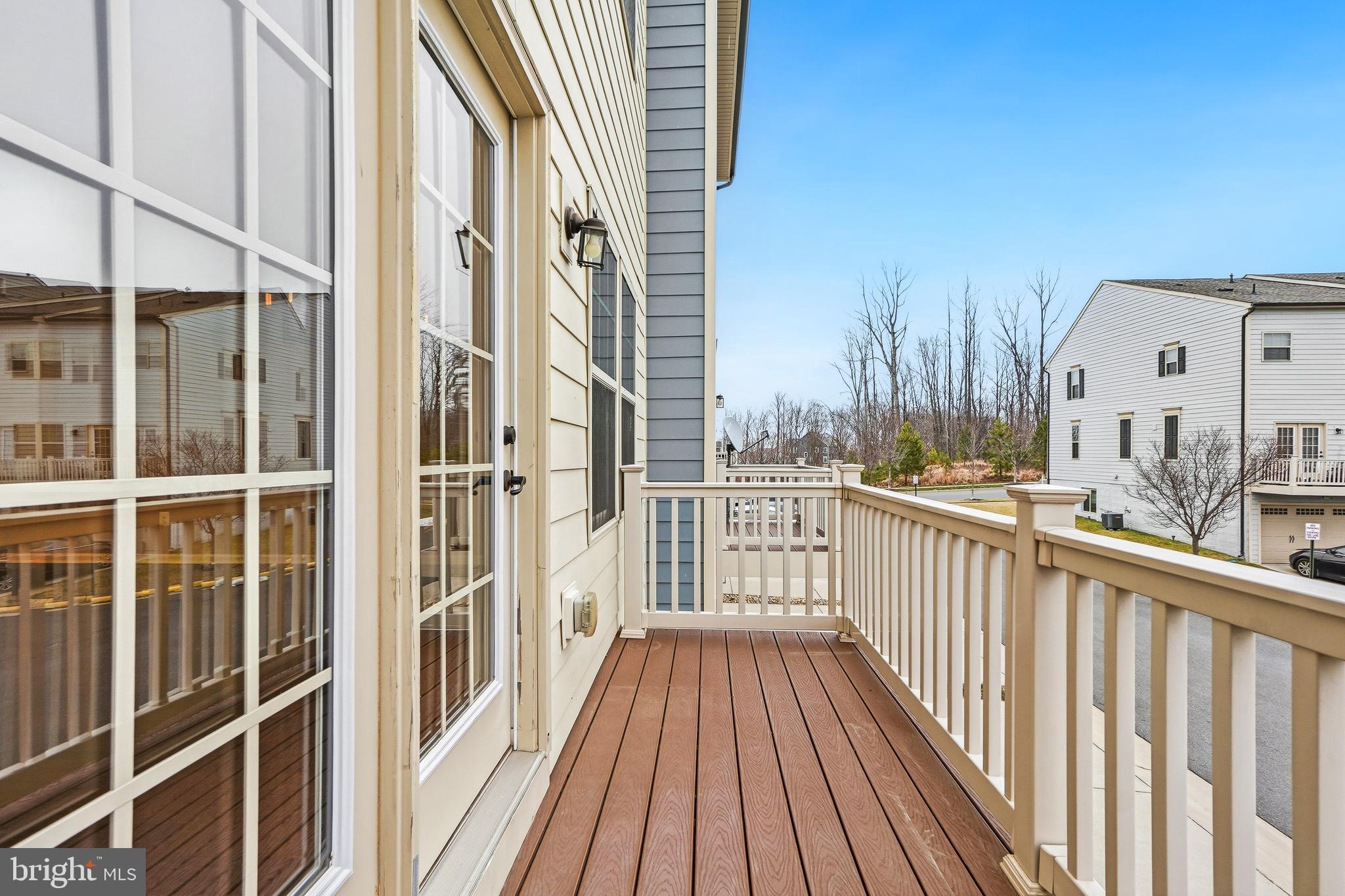 2011 Serviceberry Road Dumfries, VA 22026 - Photo 24 of 25 a view of a balcony with wooden floor