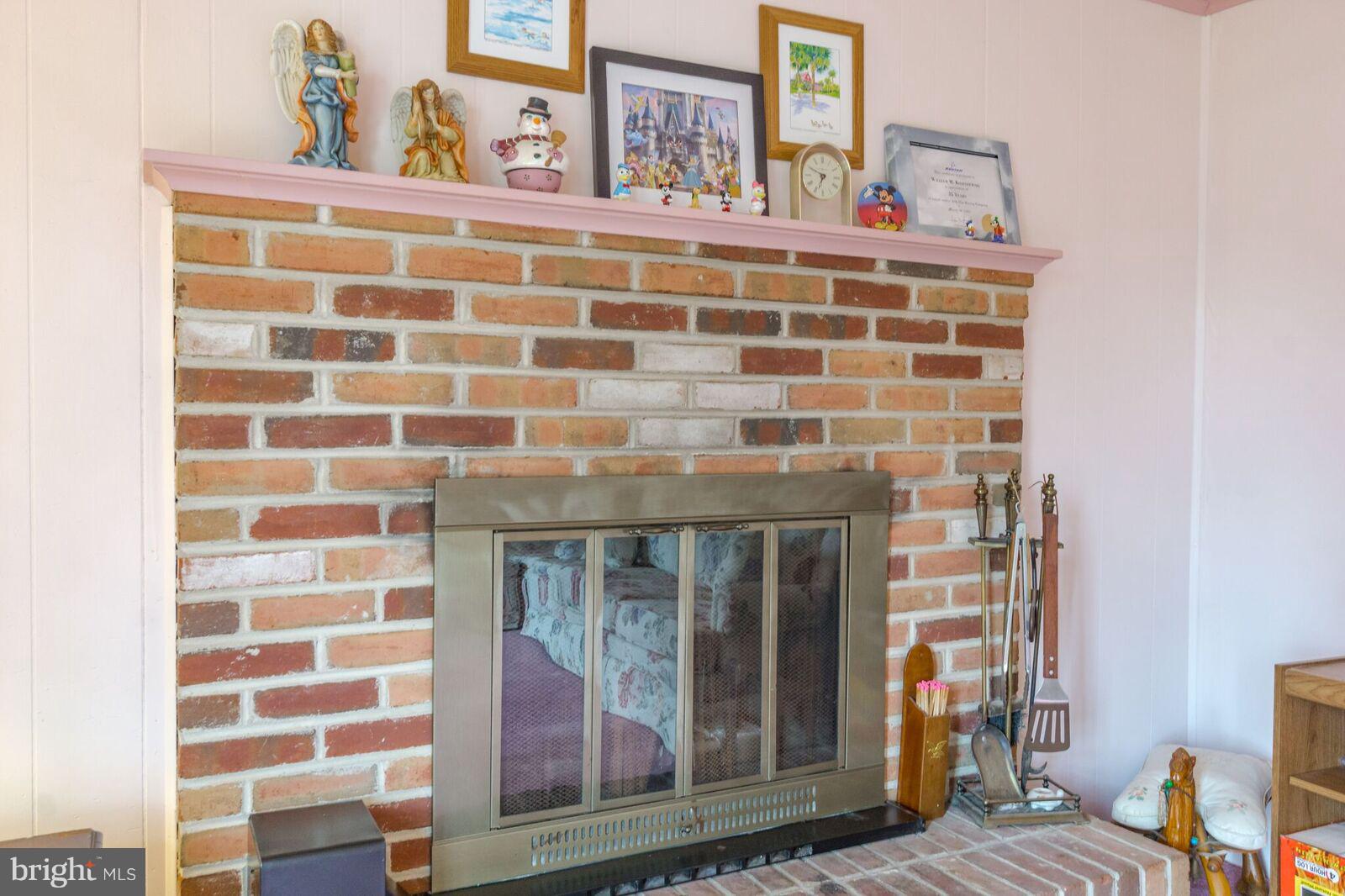 4475 Bethel Road Boothwyn, PA 19061 - Photo 32 of 32 Wood burning Brick Fireplace with Raised Hearth
