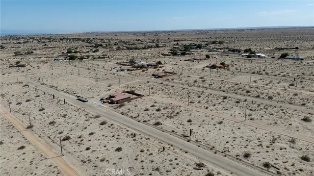 a black and white photo of a bench