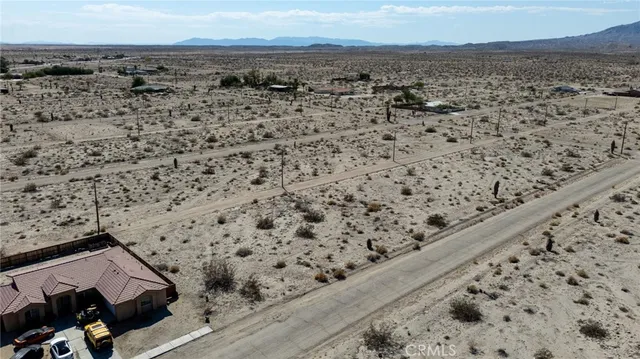 a view of roof with wooden stairs
