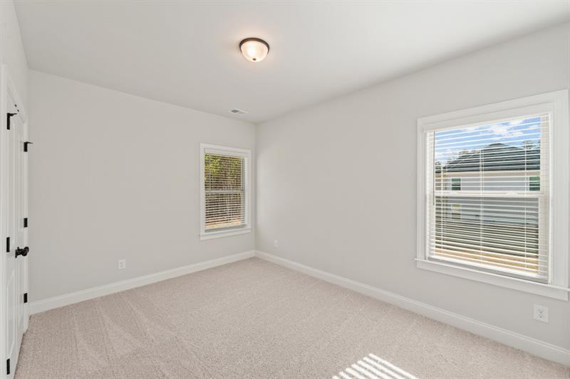 3264 Lions Ruby Lane Atlanta, GA 30349 - Photo 13 of 29 a view of an empty room with a window