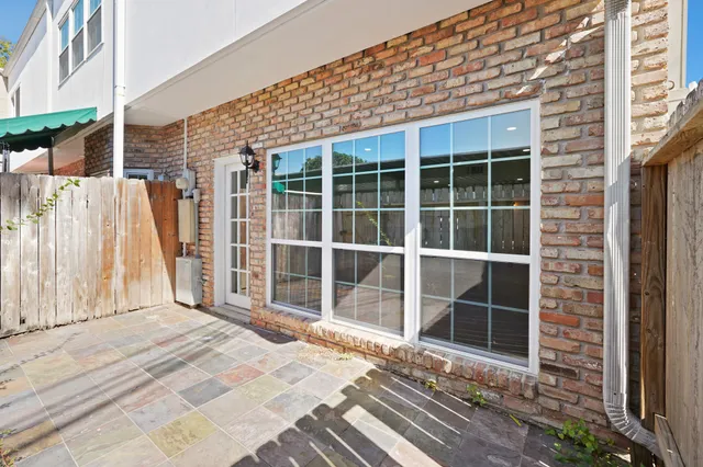 a view of a house with a large window