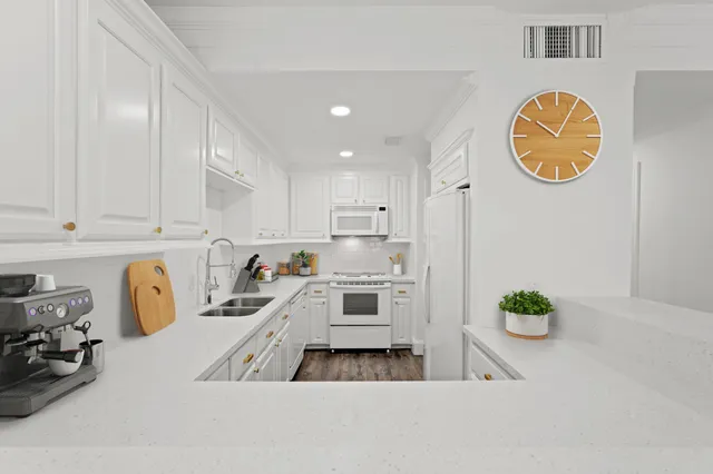 a kitchen with a cabinets and a stove