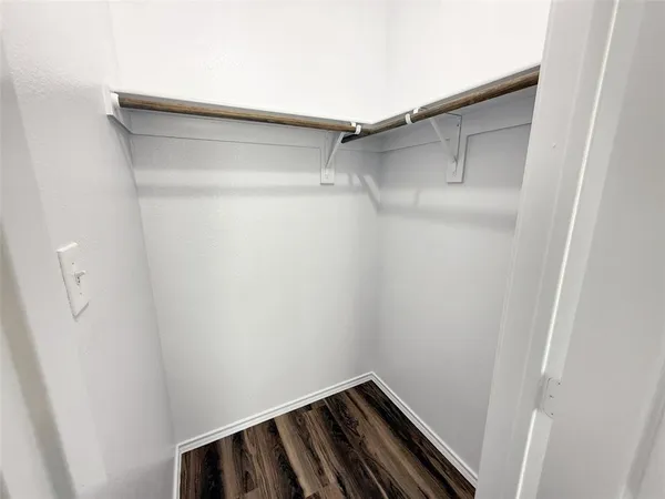 a view of a room with racks on the wall