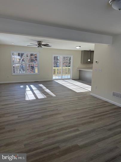 144 Pratts Branch Road Felton, DE 19943 - Photo 12 of 39 a view of empty room with window and wooden floor