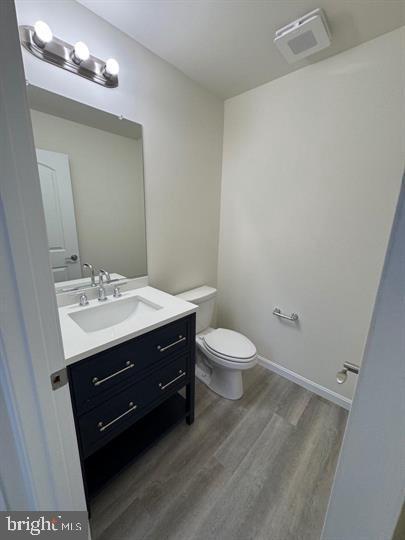 144 Pratts Branch Road Felton, DE 19943 - Photo 21 of 39 a bathroom with a sink vanity and a toilet