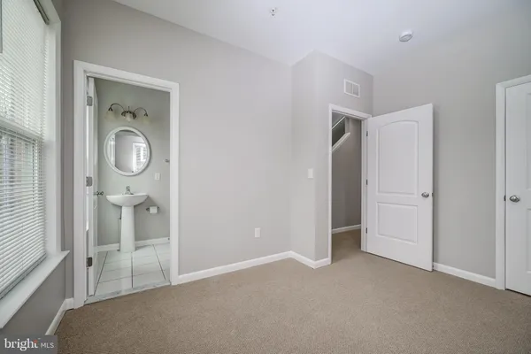 a view of a hallway with closet area