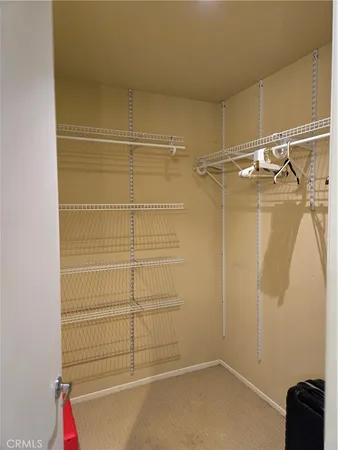 a view of a room with racks on the wall