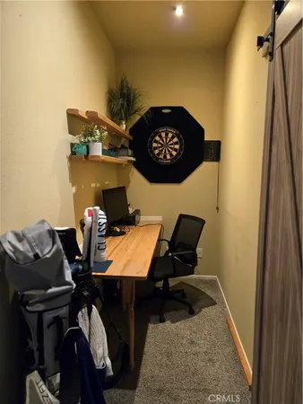 a room with furniture and wooden floor