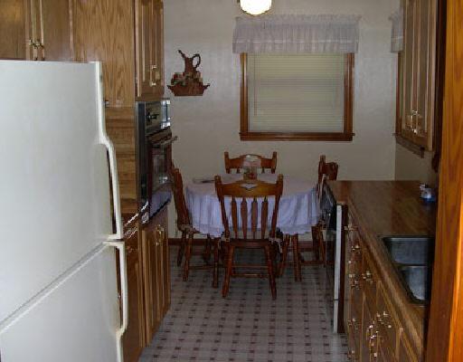 2246 Blue Ridge Springs Road Blue Ridge, VA 24064 - Photo 4 of 5 a dining room with furniture and a window