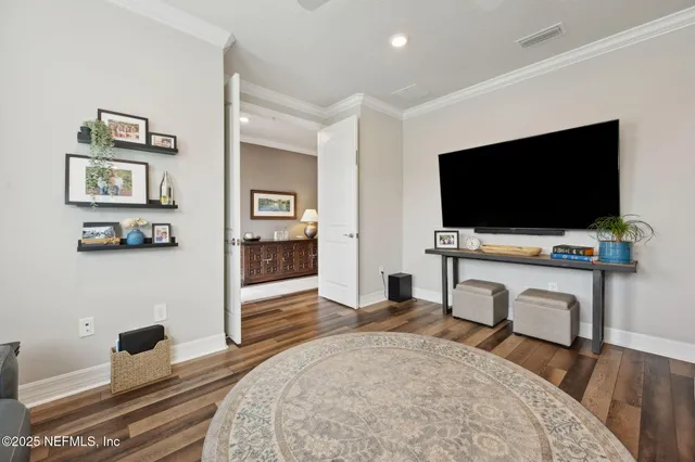 a large white kitchen with a large window