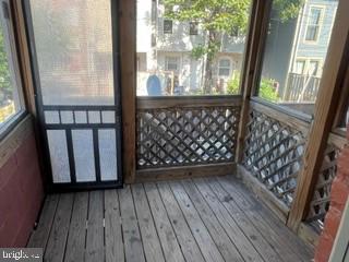917 North Port Street Baltimore, MD 21205 - Photo 6 of 14 a view of a porch with wooden floor