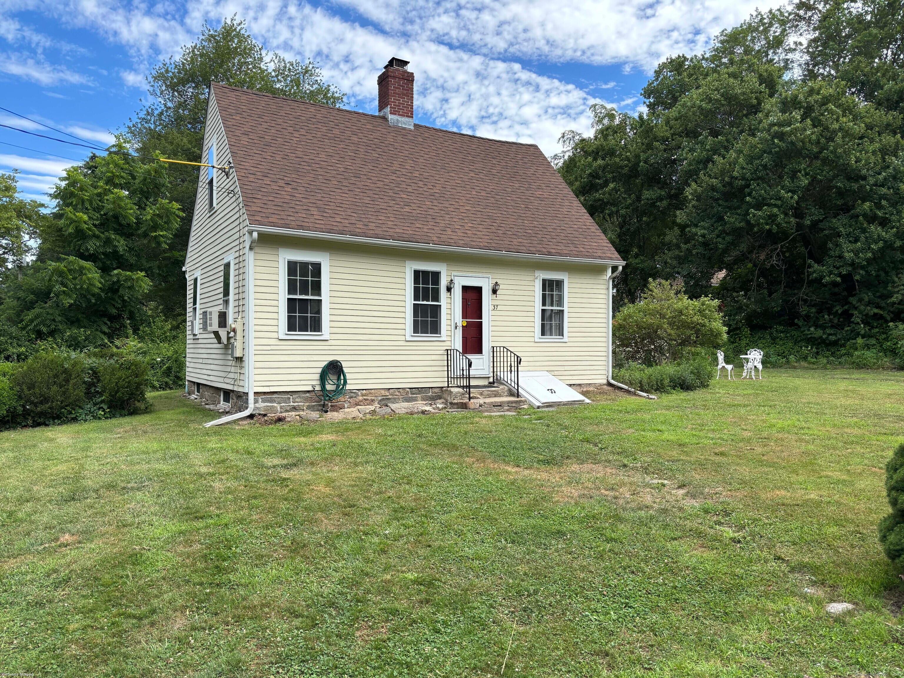 a house view with a garden space