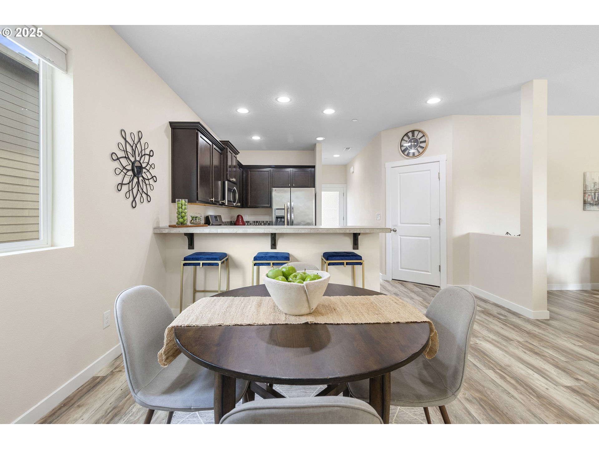 7417 North 92nd Avenue Camas, WA 98607 - Photo 15 of 48 a kitchen with a dining table chairs and kitchen view