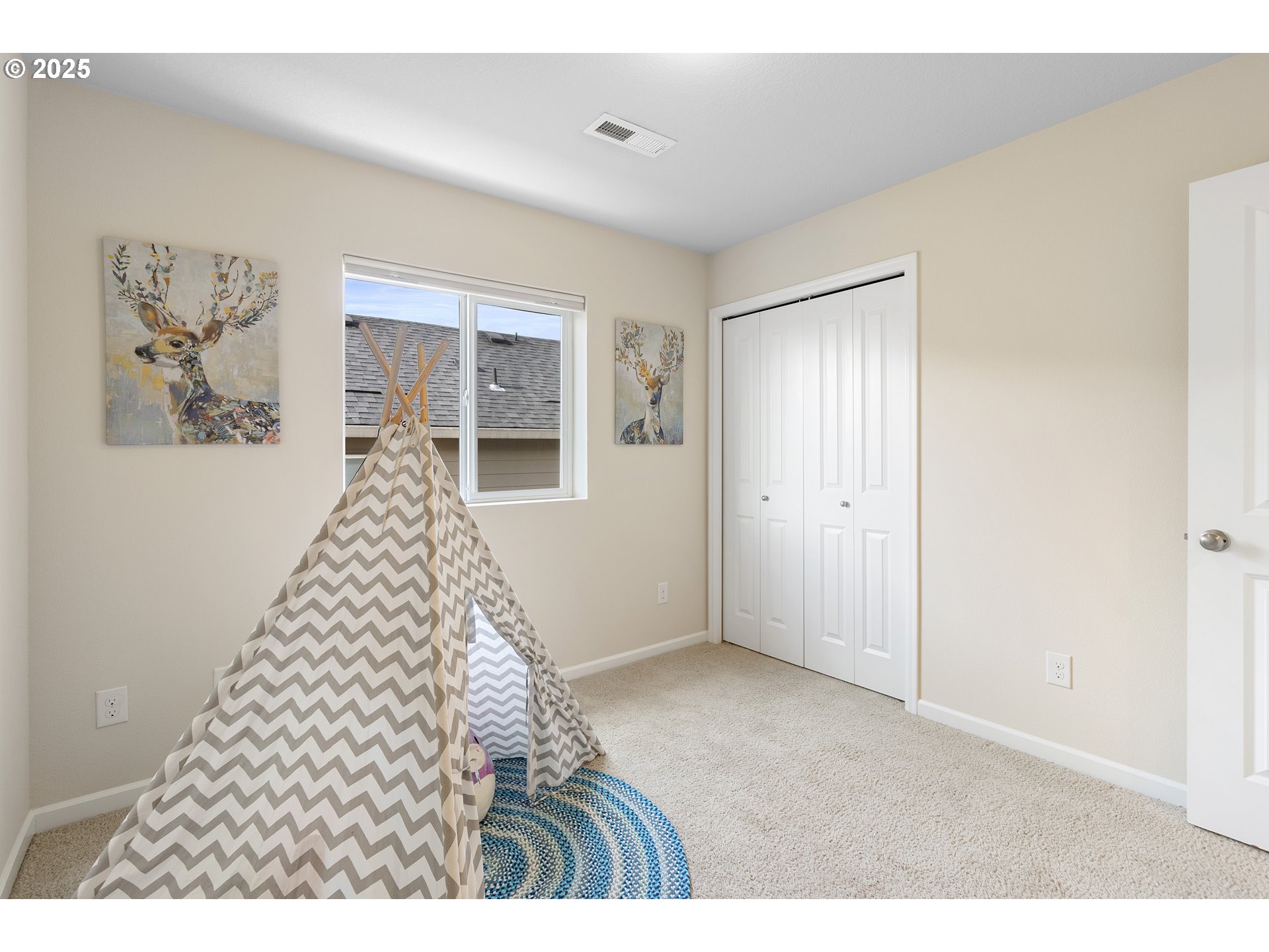7417 North 92nd Avenue Camas, WA 98607 - Photo 34 of 48 a view of a bedroom with wooden floor and windows