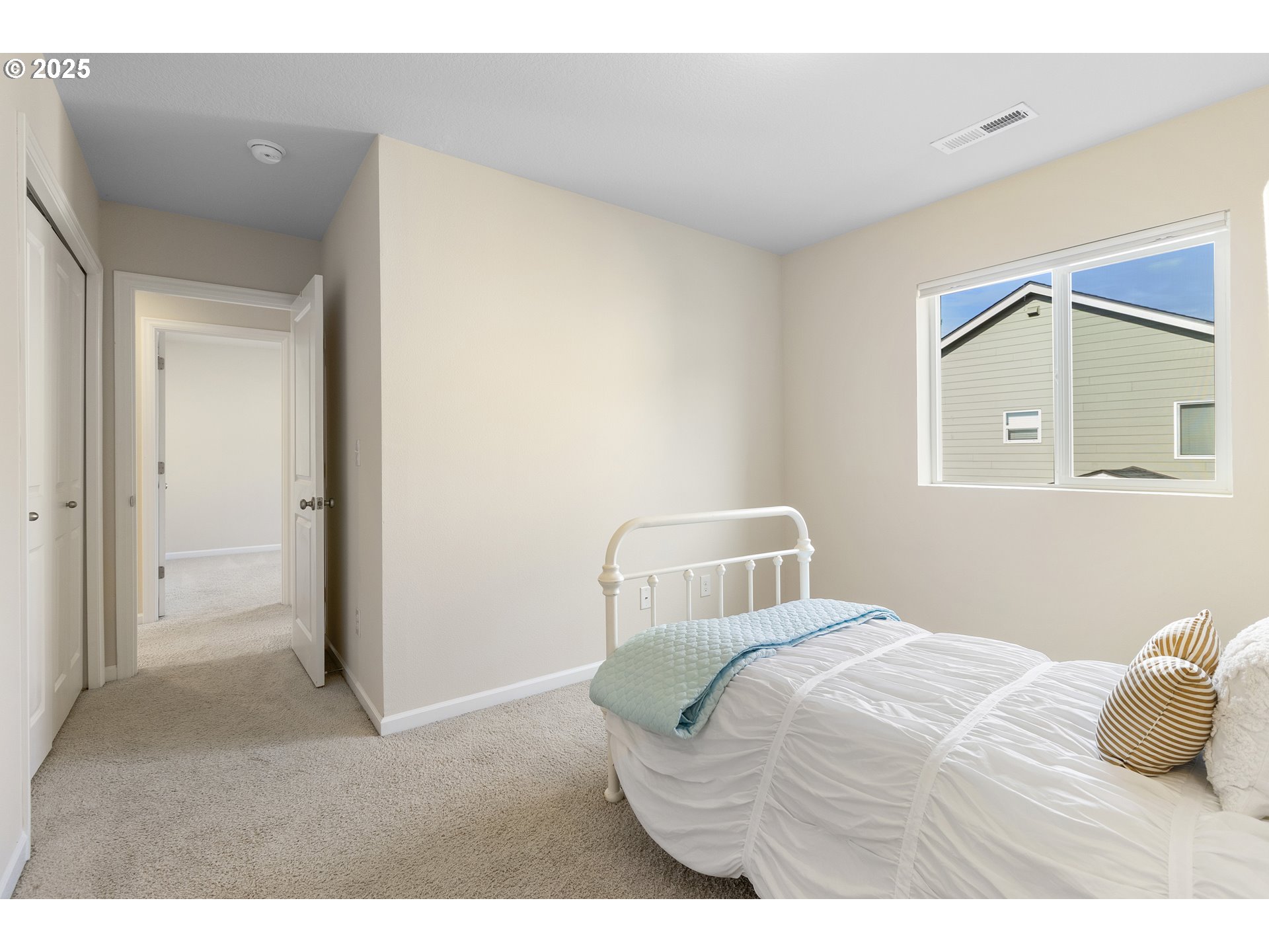 7417 North 92nd Avenue Camas, WA 98607 - Photo 40 of 48 a bedroom with a bed and a cabinets