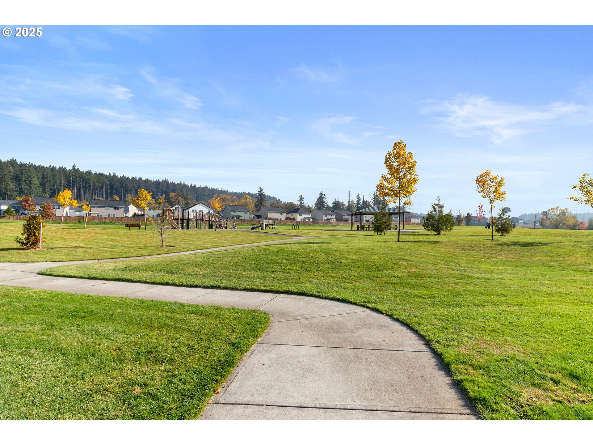 7417 North 92nd Avenue Camas, WA 98607 - Photo 46 of 48 a view of a golf course with a lake
