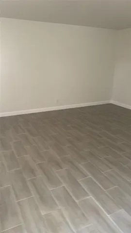 a view of a room with an empty space