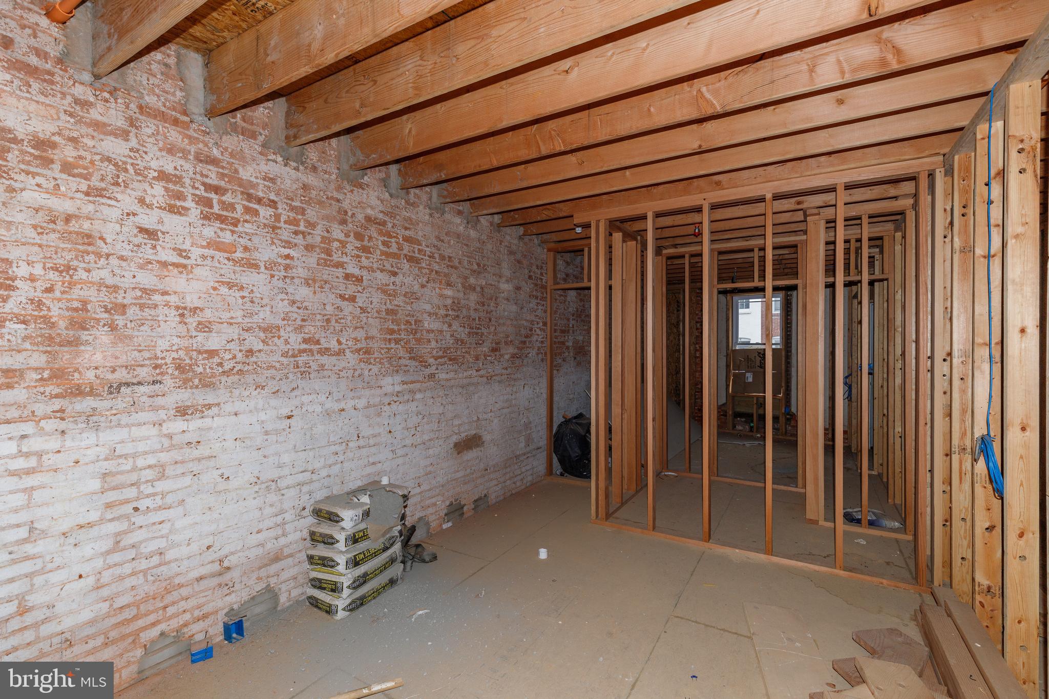 1729 Light Street Baltimore, MD 21230 - Photo 12 of 37 a view of a small room with wooden floor