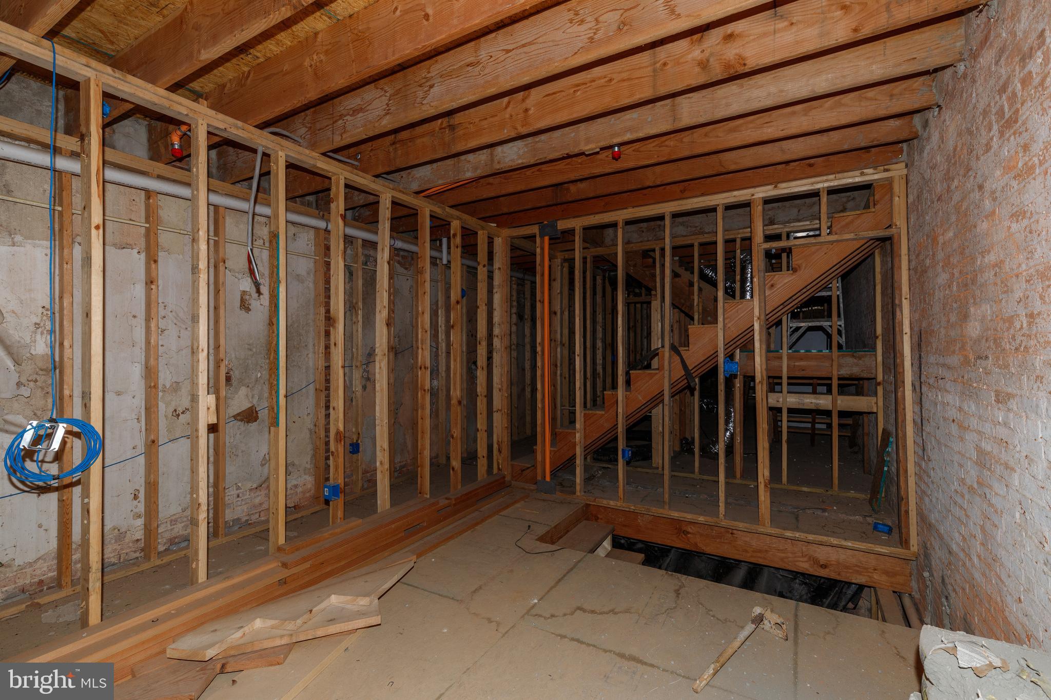 1729 Light Street Baltimore, MD 21230 - Photo 13 of 37 a view of entryway with wooden floor and stairs